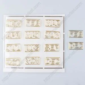 gold paper clips, month shaped paper clips